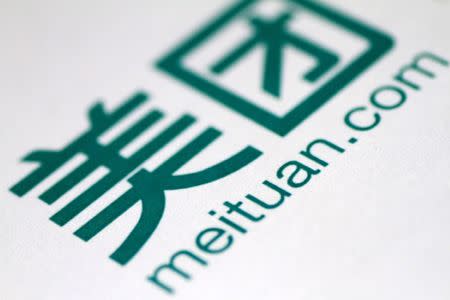 The Meituan logo is seen in this illustration photo October 19, 2017. REUTERS/Thomas White/Illustration
