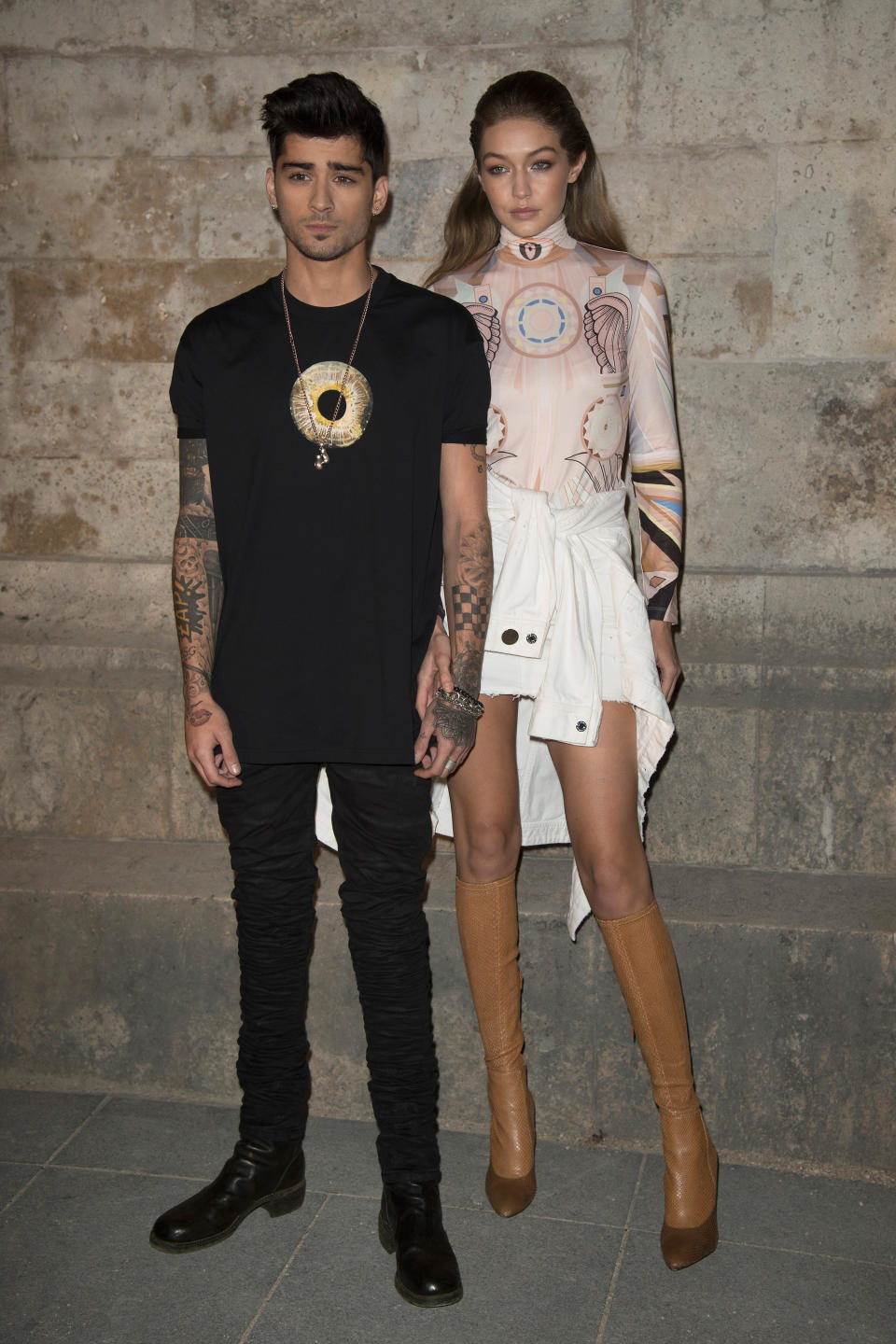 Zayn and GIgi standing together