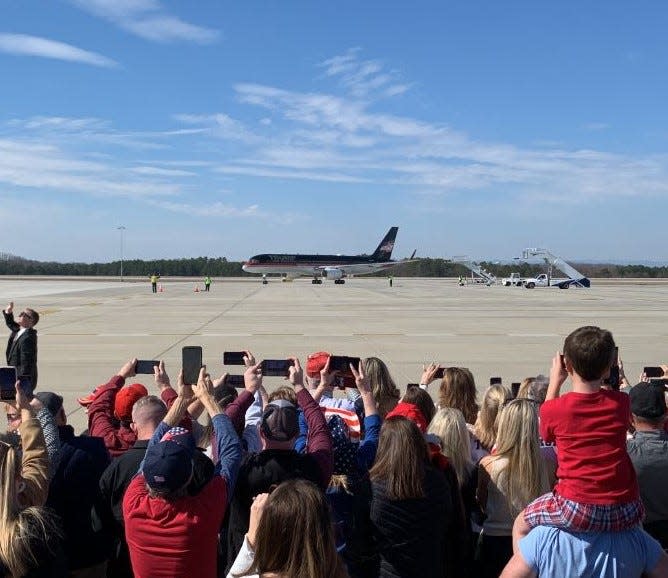 President Trump's plane, Trump Force One, lands at the Greenville-Spartanburg International Airport.