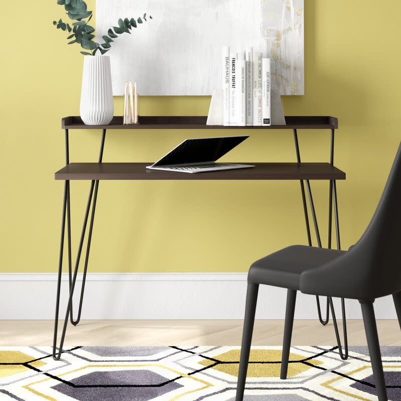 <p><a href="https://go.redirectingat.com?id=74968X1596630&url=https%3A%2F%2Fwww.wayfair.com%2F--%2Fpdp%2Fgeorge-oliver--daytin-desk-x116593868-l32-w005482757.html&sref=https%3A%2F%2F" rel="nofollow noopener" target="_blank" data-ylk="slk:Shop Now;elm:context_link;itc:0;sec:content-canvas" class="link rapid-noclick-resp">Shop Now</a></p><p>Daytin 44.7” Desk </p><p>wayfair.com</p><p>$82.99</p><span class="copyright">Wayfair</span>