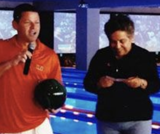 Nevin Shapiro said this photo was taken during a basketball fundraiser in 2008, in which the booster donated $50,000 to the program. On the right is University of Miami president Donna Shalala, holding Shapiro’s donation check. (Yahoo Sports)  