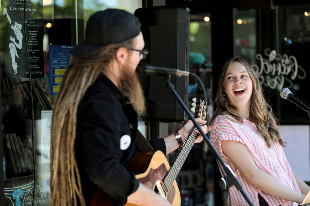 Shmorgan performs in front of The Freckled Bee during the 2022 Make Music Day in Salem.