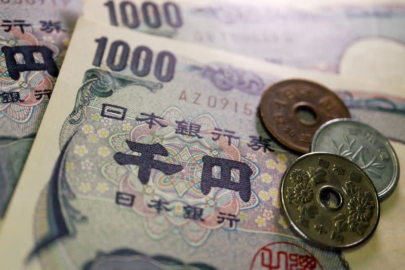 FILE PHOTO: Illustration picture of Japanese yen coins and banknotes