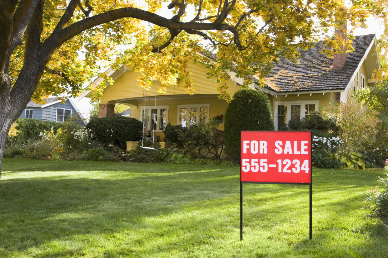 Even when home prices slip, it's still important to make sure you're financially prepared to buy a new house. / Credit: Getty Images