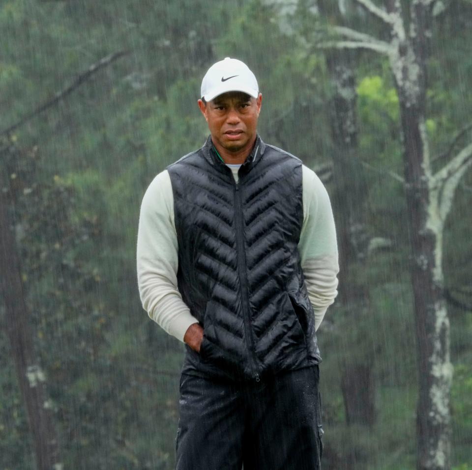 Tiger Woods prepares to putt on the 18th green during the second round of The Masters.