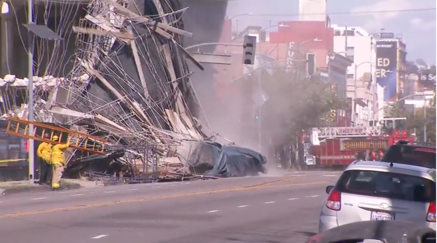 Scaffolding in Hollywood was impacted by gusty winds in Southern California. The Los Angeles Fire Department was on the scene after the scaffolding fell onto nearby power lines on May 5, 2024. (KTLA)