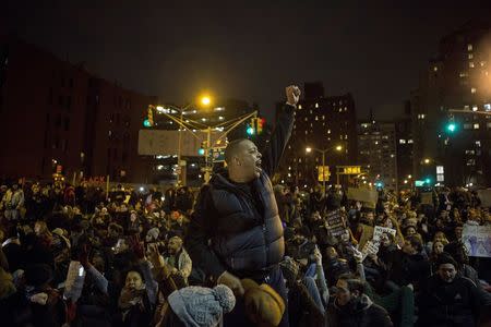 Protesters gather in Manhattan as thousands take to the streets of New York demanding justice for the death of Eric Garner December 5, 2014. REUTERS/Eric Thayer