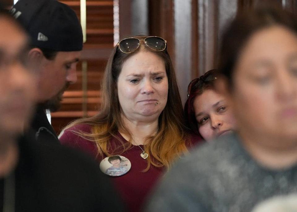 Nikki Cross, mother of Uvalde school shooting victim Uziyah Garcia, listens at a news conference at the Capitol on Tuesday May 2, 2023, to demand action on raising the minimum age to buy AR-15-style guns to 21 years old.
