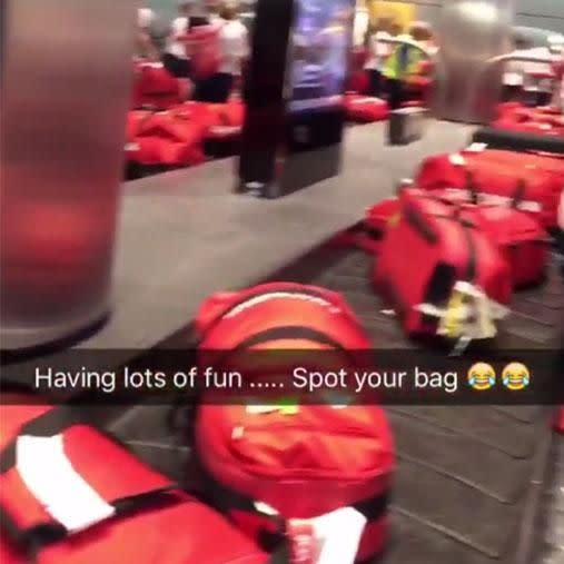 Gymnast Beckie Downey tweeted a video of everyone searching through the luggage. Image: Twitter/Bdownie