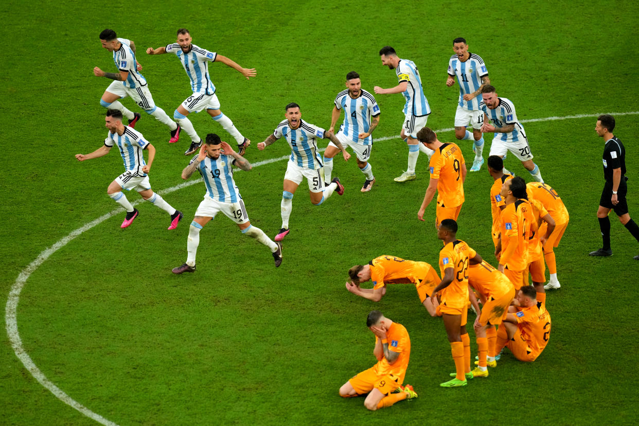 Argentina players celebrate after winning the penalty shoot-out of the FIFA World Cup Quarter-Final match at the Lusail Stadium in Lusail, Qatar. Picture date: Friday December 9, 2022. (Photo by Peter Byrne/PA Images via Getty Images)