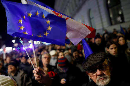 People gather in front of the Presidential Palace during a protest against judicial reforms in Warsaw, Poland, November 24, 2017. REUTERS/Kacper Pempel