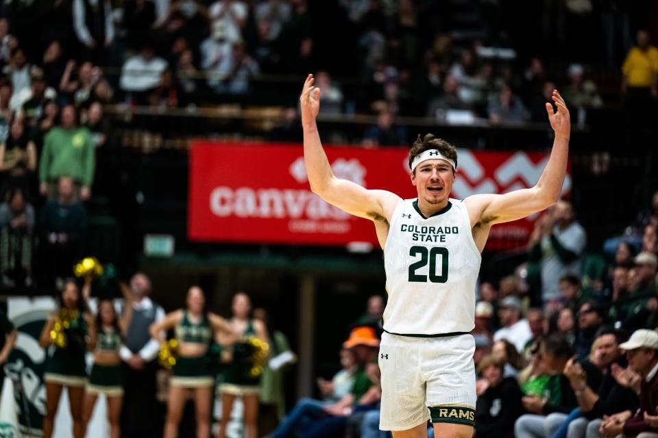 Colorado State University's Joe Palmer (20) celebrates during their game against Air Force at Moby Arena on Tuesday Jan. 16. CSU won 78-69 in overtime.