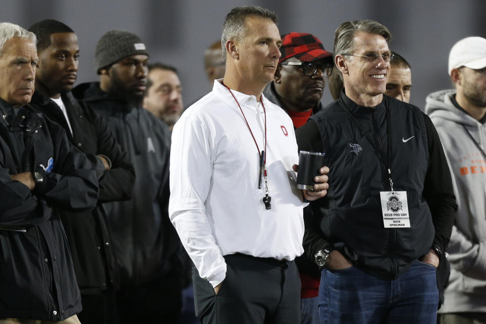 Ohio State head coach Urban Meyer watches players run drills during Ohio State's pro day in March. (AP) 