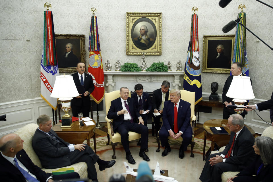 President Donald Trump and Turkish President Recep Tayyip Erdogan meet in the Oval Office with Republican senators at the White House Wednesday, Nov. 13, 2019, in Washington. (AP Photo/Patrick Semansky)