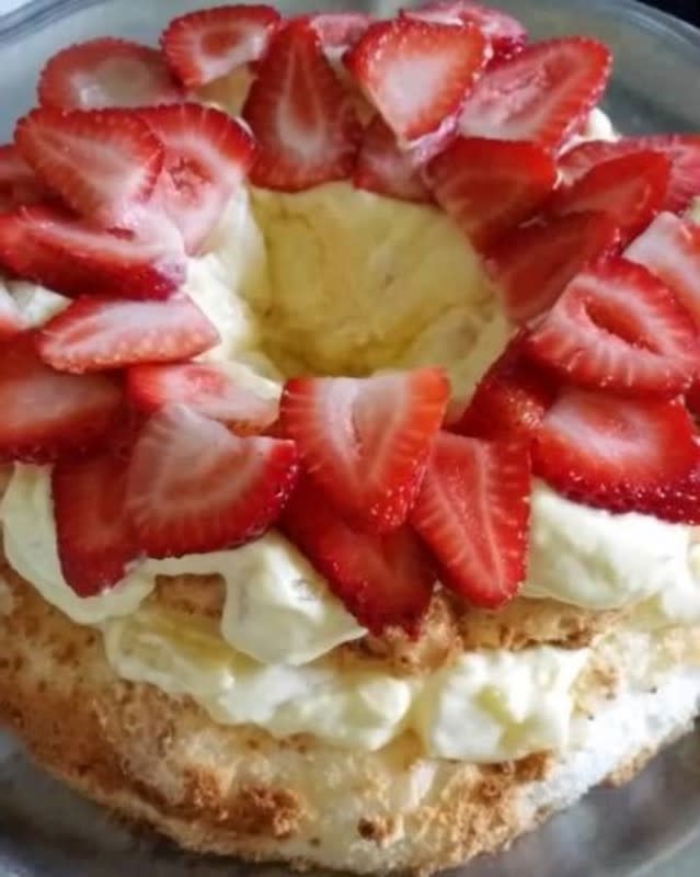 <p>Moore or Less Cooking</p><p>This a tasty dessert that you can put together quickly if you need a last-minute treat for a potluck or dinner party! <a href="https://mooreorlesscooking.com/2015/07/04/angel-lush-cake/" rel="nofollow noopener" target="_blank" data-ylk="slk:Get the recipe here;elm:context_link;itc:0;sec:content-canvas" class="link rapid-noclick-resp">Get the recipe here</a></p>