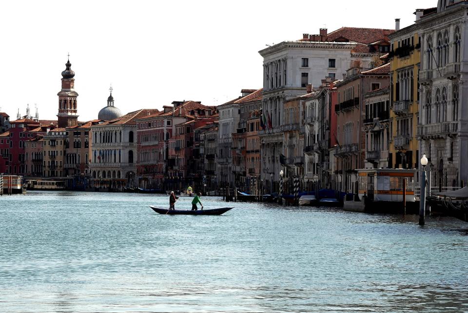 Image: A deserted canal in Venice on  on April 5, 2021. (Andrea Pattaro / AFP - Getty Images)