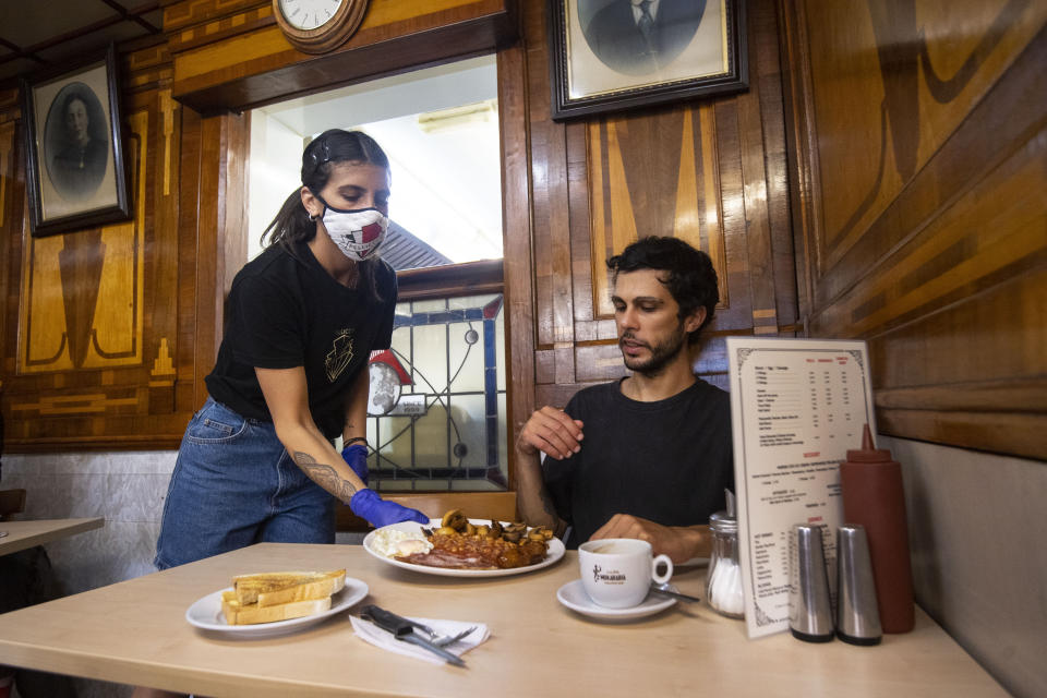 File photo dated 03/07/20 of Pellicci's Cafe in Bethnal Green, east London. Chancellor of the Exchequer Rishi Sunak announced, in his summer economic update, a VAT cut from 20% to 5%, from next Wednesday until January 12, in the hospitality sector which will have an impact on eat-in or hot takeaway food from restaurants, cafes and pubs.