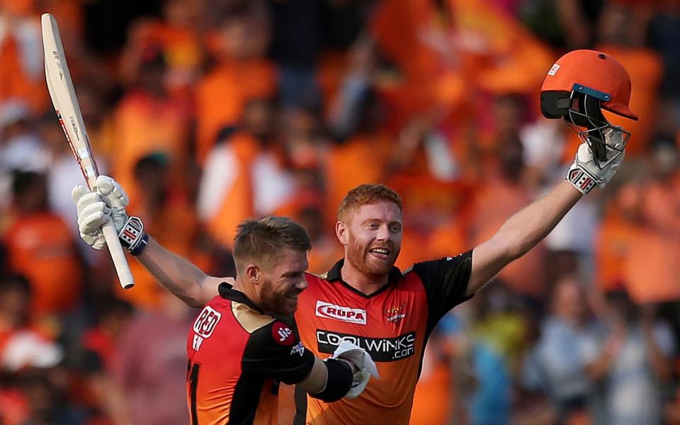 Sunrisers Hyderabad's David Warner, left, greets Jonny Bairstow on scoring hundred runs against Royal Challengers Bangalore during the VIVO IPL T20 cricket match in Hyderabad, India, Sunday, March 31, 2019. - AP