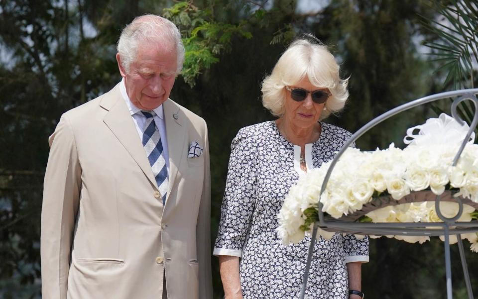 The Prince of Wales and the Duchess of Cornwall after laying a wreath at the Kigali Genocide Memorial - Jonathan Brady/PA Wire