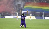 Orlando player Antonio Carlos kneels before the start of the San Jose Earthquakes at Orlando City MSL soccer match in Orlando, Fla., on Tuesday, June 22, 2021. (Stephen M. Dowell /Orlando Sentinel via AP)