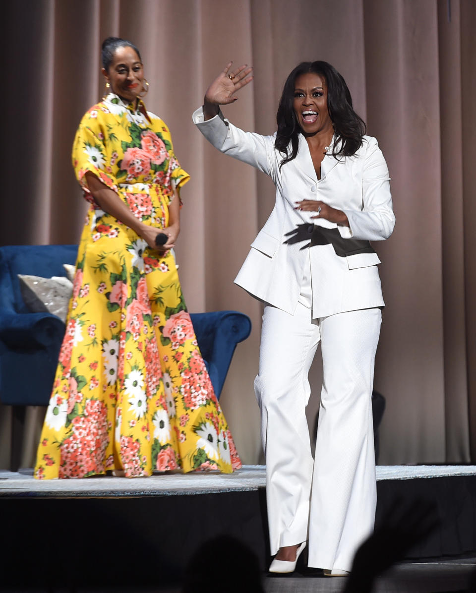 The author appears onstage with Tracee Ellis Ross at Becoming: An Intimate Conversation with Michelle Obama at the Forum on Nov. 15 in Inglewood, California.&nbsp;