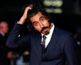Dev Patel poses as he arrives for the gala screening of the film "Lion", during the 60th British Film Institute (BFI) London Film Festival at Leicester Square in London, Britain October 12, 2016. REUTERS/Peter Nicholls