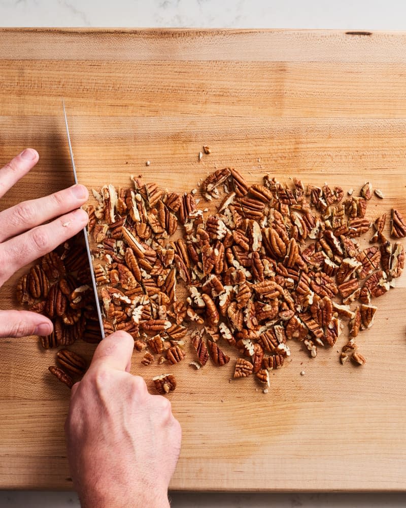 Someone chopping pecans.