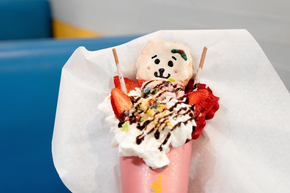 A white BT21 RJ cookie sits atop a bubble waffle dessert at Mango Rabbit Boba shop on Dec. 17, 2022, in Tempe.