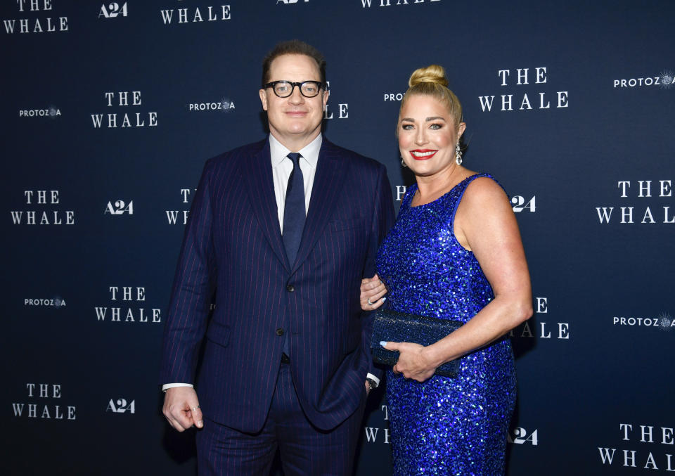 Actor Brendan Fraser, left, and girlfriend Jeanne Moore attend the premiere of "The Whale" at Alice Tully Hall on Tuesday, Nov. 29, 2022, in New York. (Photo by Evan Agostini/Invision/AP)