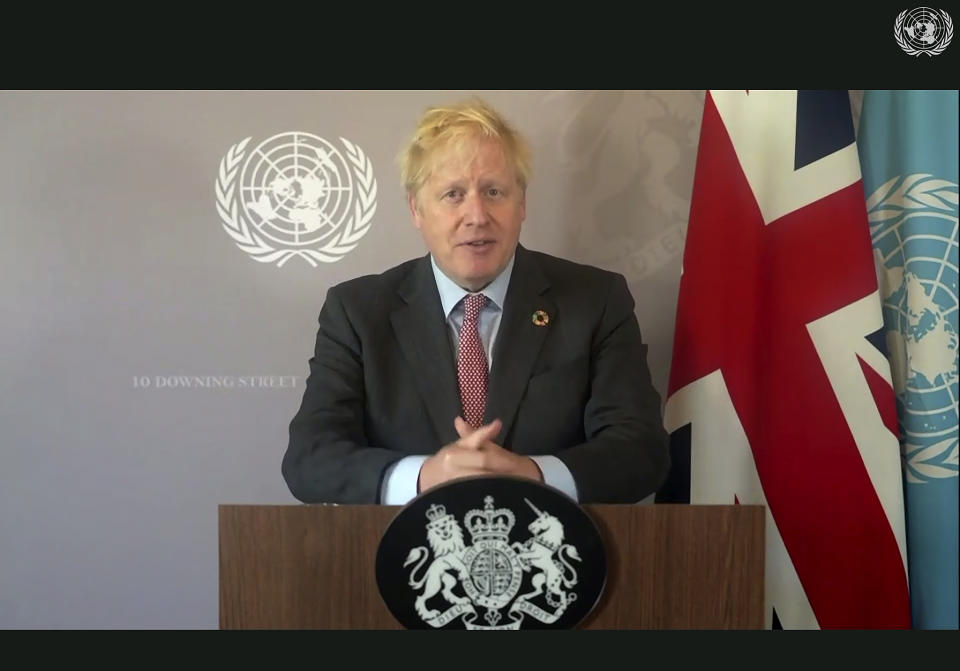 In this photo made from UNTV video, British Prime Minister Boris Johnson speaks in a pre-recorded message which was played during the 75th session of the United Nations General Assembly, Saturday, Sept. 26, 2020, at UN Headquarters. (UNTV Via AP )