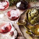 <p>This simple, floral cocktail is made with hibiscus flowers in syrup. Perfect for a Summer garden party.</p><p><strong>Recipe: <a href="https://www.goodhousekeeping.com/uk/food/recipes/a538415/pucks-mischief/" rel="nofollow noopener" target="_blank" data-ylk="slk:Puck's mischief;elm:context_link;itc:0;sec:content-canvas" class="link ">Puck's mischief</a></strong></p>