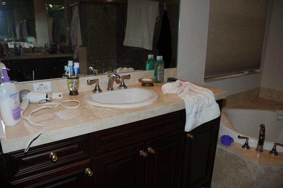 The towel in Neal Jacobson’s bathroom that he used to dry off blood after murdering his wife, Franki, and twin boys, Eric and Joshua, on Jan. 23, 2010.