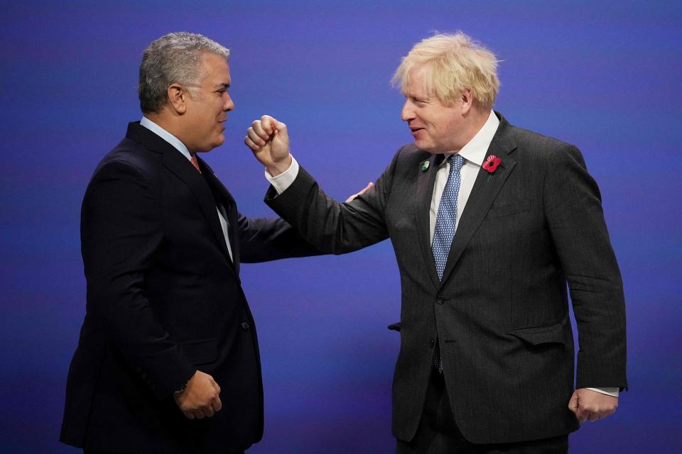 Boris Johnson greets Colombia's President Ivan Duque (AFP via Getty Images)