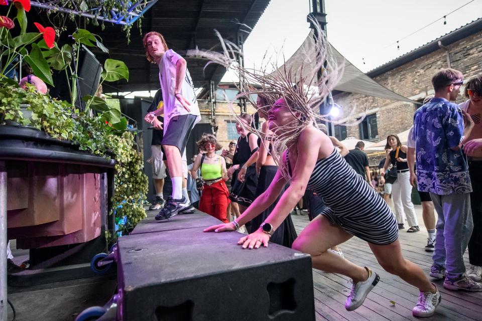 Revellers dance at a rave party in central Kyiv, Ukraine August 27, 2022.