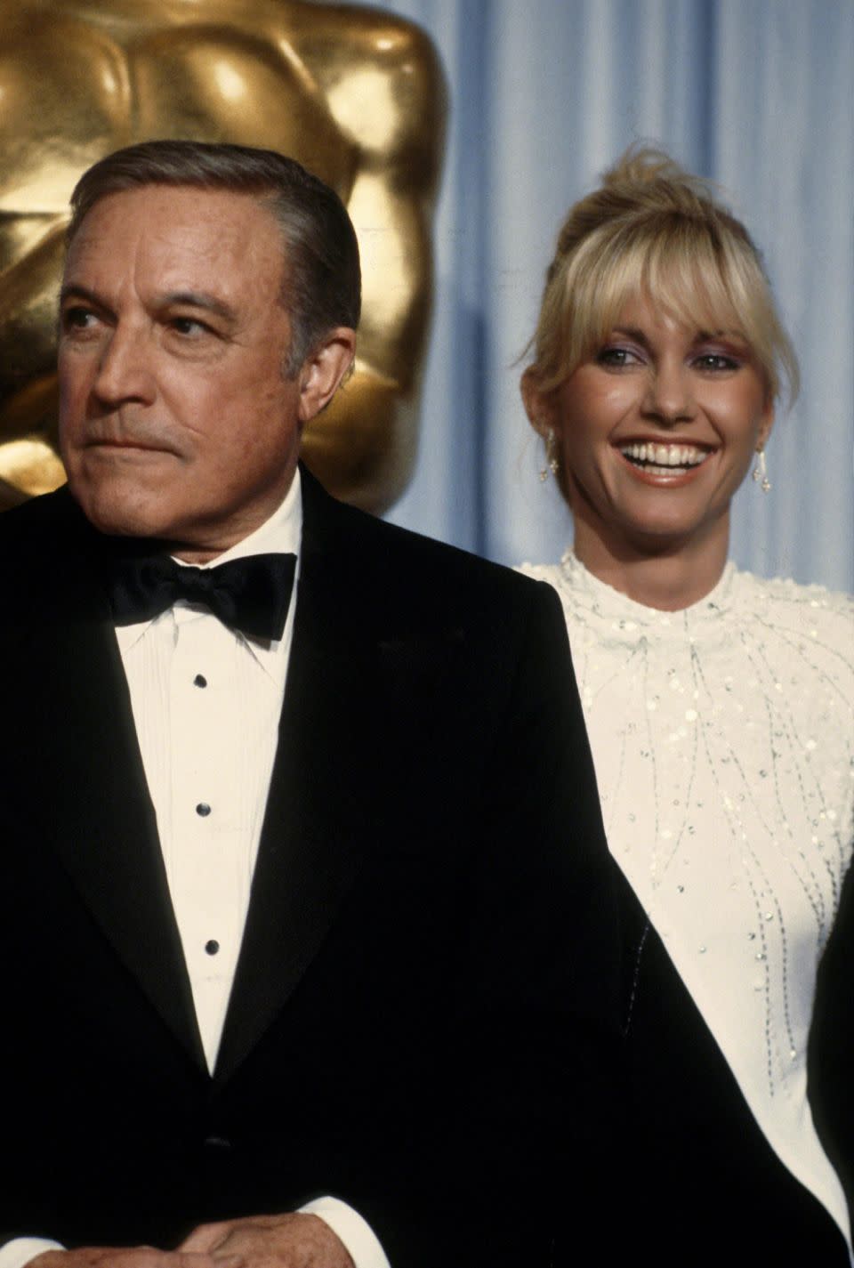 Gene Kelly starred alongside Olivia and Matt in the 1980 film Xanadu. The Hollywood icon is pictured here with Olivia at the 1980 Academy Awards. Source: Getty