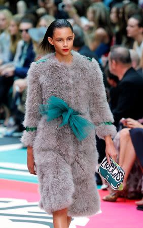 A model presents a creation from the Burberry Prorsum Spring/Summer 2015 collection during London Fashion Week September 15, 2014. REUTERS/Suzanne Plunkett