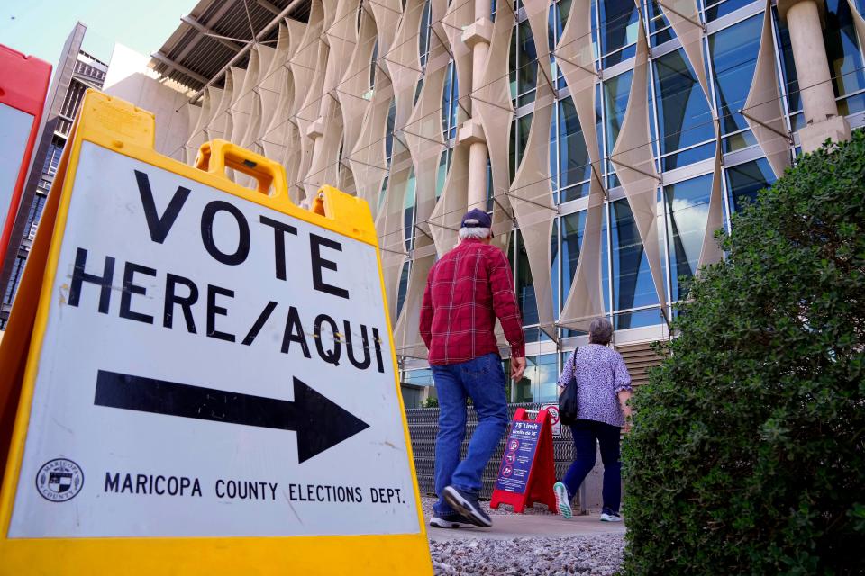 March 19, 2024; Phoenix, Ariz; U.S.; Paul and Carol Hunt head to the polls to vote in the Presidential Preference Election at the Burton Barr Central Library.