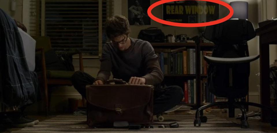 Peter sitting on the floor of his room, looking through his father's leather bag, in "The Amazing Spider-Man"