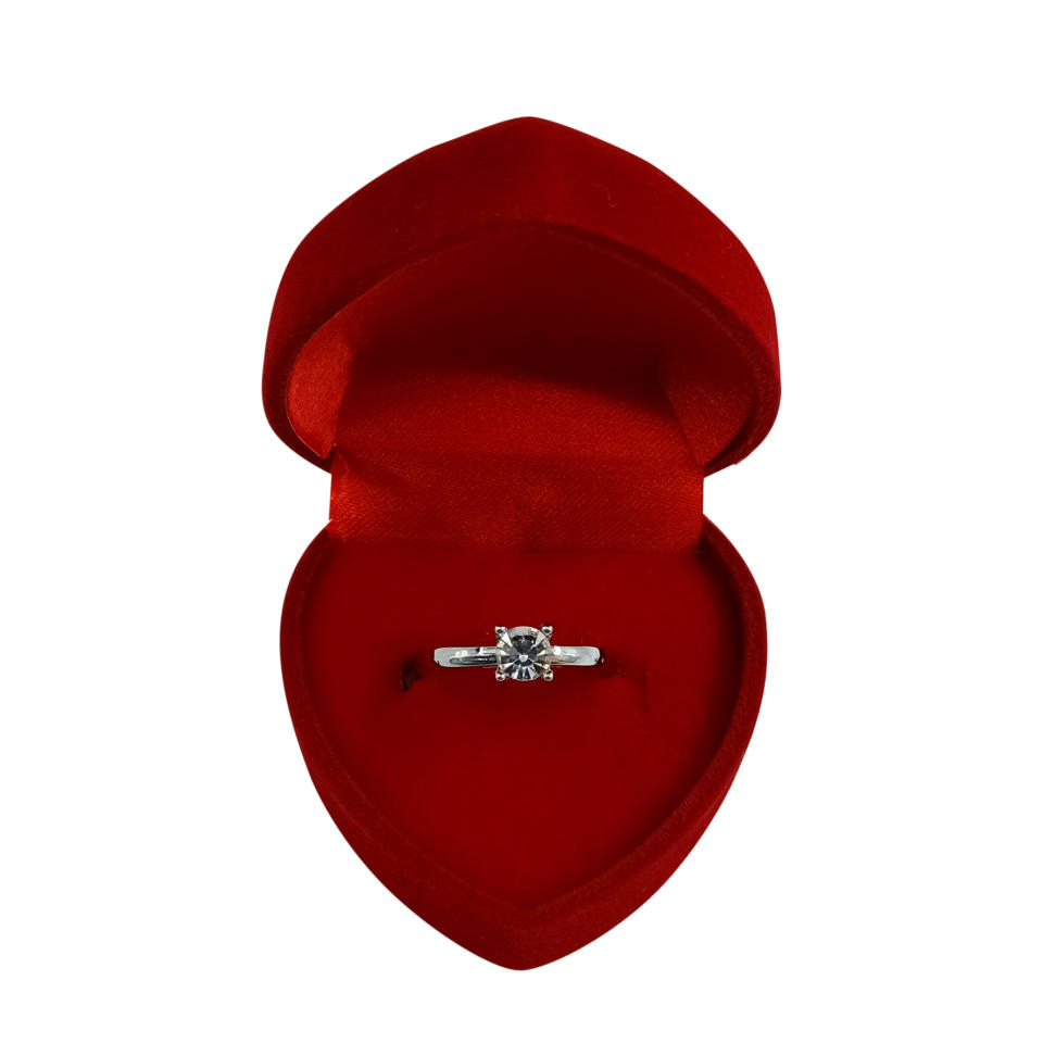 The rings come in a heart shaped box and feature a gem-style centre stone. (Asda)