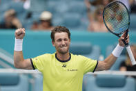 Casper Ruud of Norway celebrates after he beat Francisco Cerundolo of Argentina 6-4, 6-1, during the Miami Open tennis tournament, Friday, April 1, 2022, in Miami Gardens, Fla. (AP Photo/Wilfredo Lee)