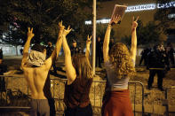 <p>Police block off the Albuquerque Convention Center to anti-Trump protests following a rally and speech by Republican presidential candidate Donald Trump in Albuquerque, N.M., Tuesday, May 24, 2016. (AP Photo/Brennan Linsley) </p>