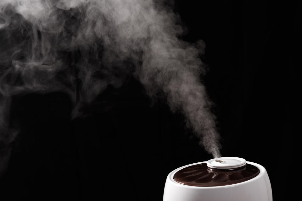 A humidifier and hot shower can help ease a nagging cough. (Image via Getty Images)