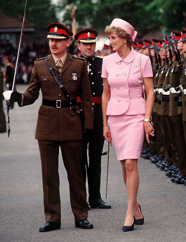 Princess Diana Reviewing The Troops Of The Princess Of Wales Regiment In Kent. The Princess Is Wearing A Pink Suit Designed By Versace.