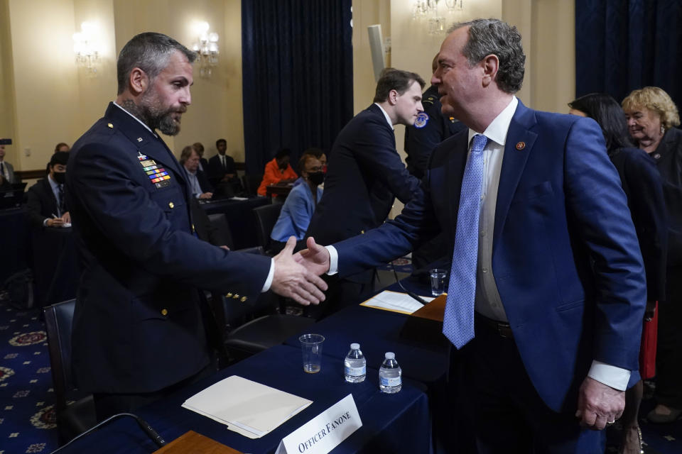 Rep. Adam Schiff, D-Calif., greets Washington Metropolitan Police Department officer Michael Fanone before the House select committee hearing on the Jan. 6 attack on Capitol Hill in Washington on July 27. 