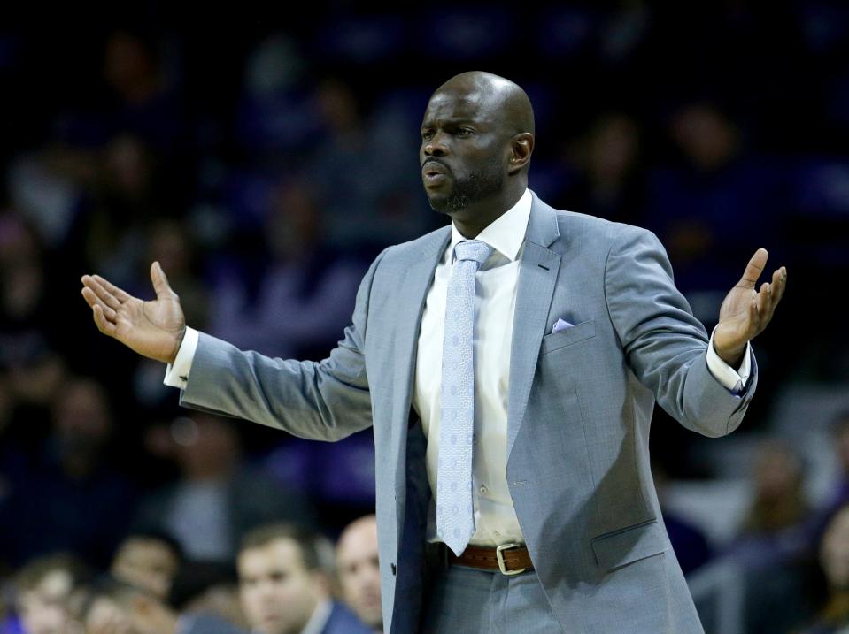 UKMC head coach Kareem Richardson reacts to a call during the second half of an NCAA college basketball game against Kansas State, Tuesday, Nov. 14, 2017, in Manhattan, Kan. Kansas State won 72-51. (AP Photo/Charlie Riedel)