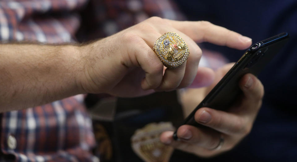Everybody wants to get their hands on a Raptors replica ring. (Getty Images)
