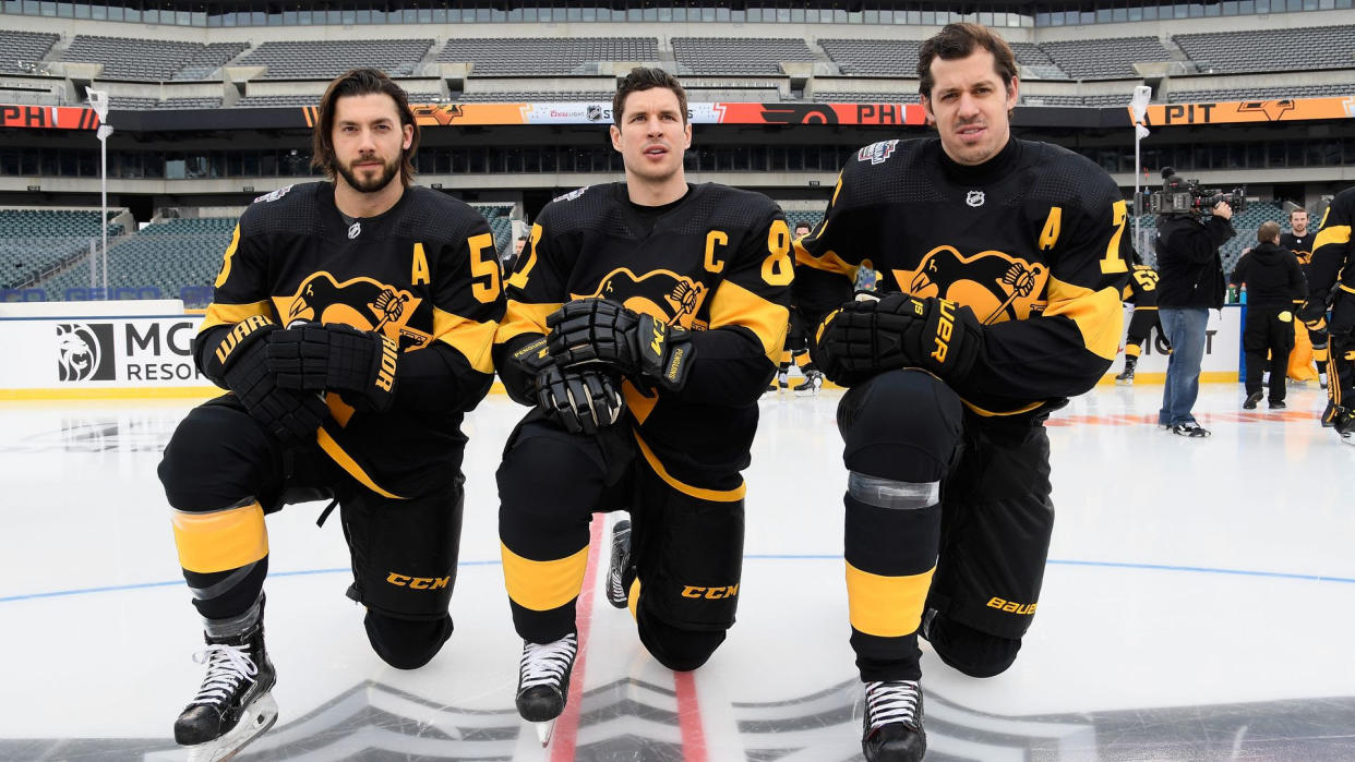 Kris Letang (L), Sidney Crosby and Evgeni Malkin in 2019. (Brian Babineau/NHLI via Getty Images)