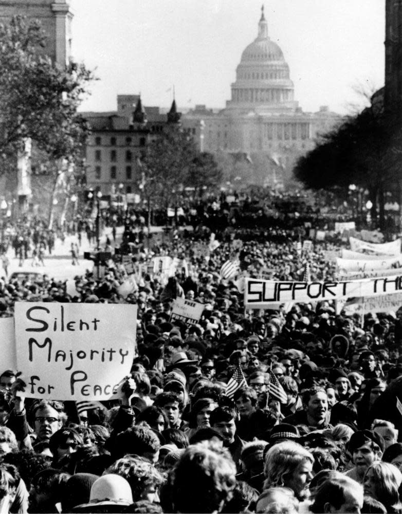 The Moratorium Day peace parade passes along Pennsylvania Avenue from the Capitol building.