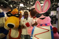 <p>Fudgie the Whale photobombs a staff member posing with Chester the Cheetah and Energizer Bunny at Yahoo Studios in New York City on Sept. 25, 2017. (Photo: Gordon Donovan/Yahoo News) </p>