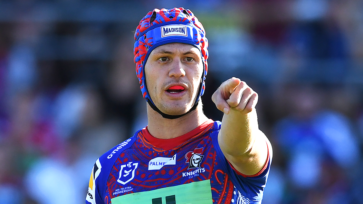 Kalyn Ponga (pictured) points during an NRL game.